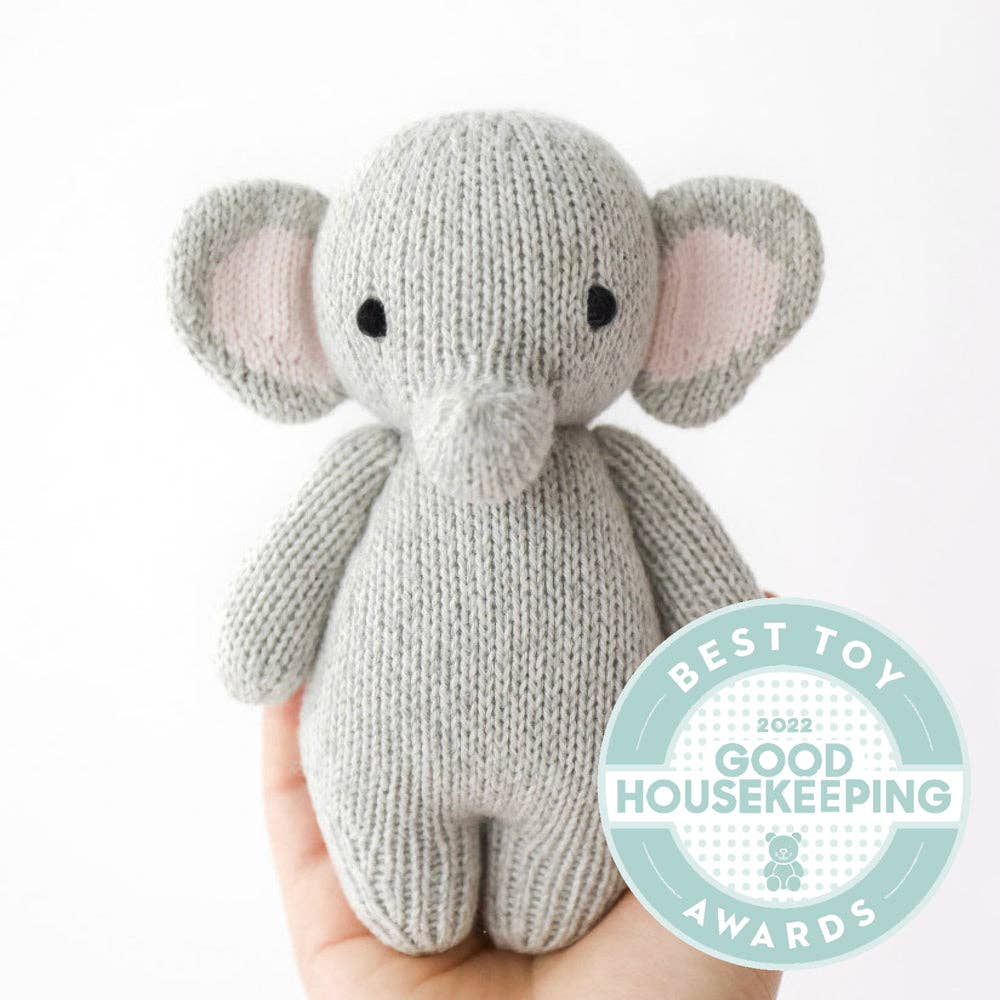 Baby elephant, gives 5 meals cudddle + kind