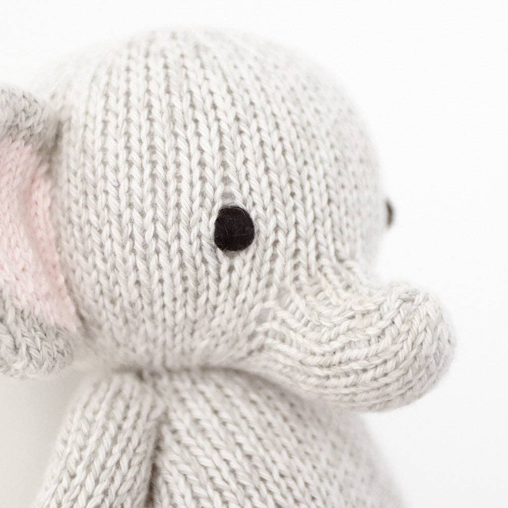 Baby elephant, gives 5 meals cudddle + kind