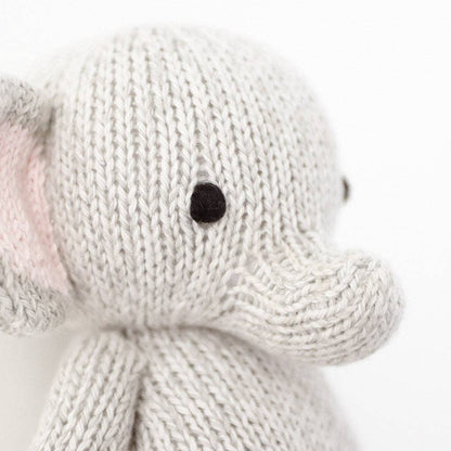 Baby elephant, gives 5 meals cudddle + kind