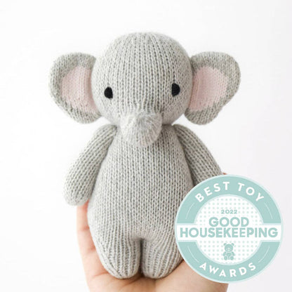 Baby elephant, gives 5 meals cudddle + kind