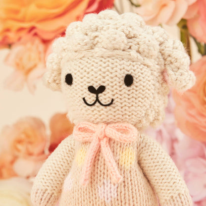 Tiny Lucy the lamb (pastel), gives 10 meals, cuddle + kind
